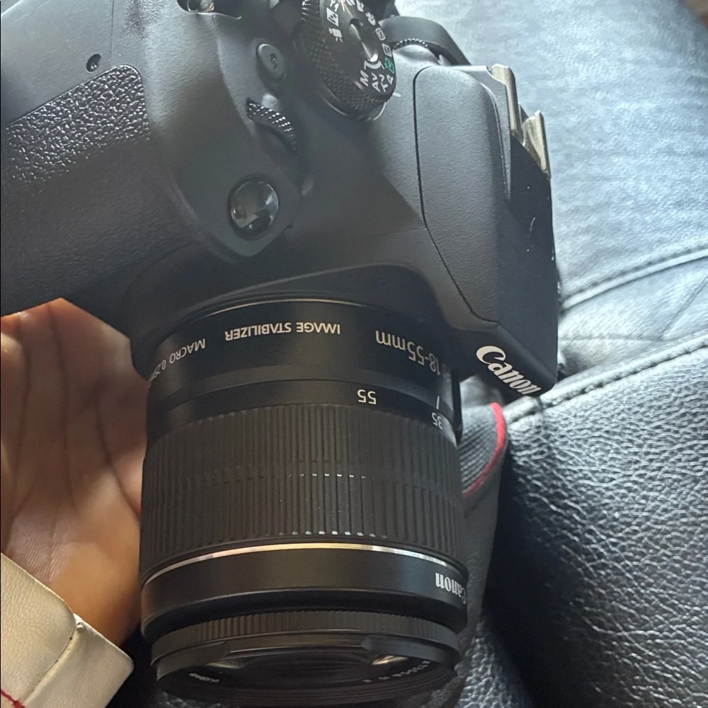 Canon DSLR Camera in Black with Red-Trim Strap